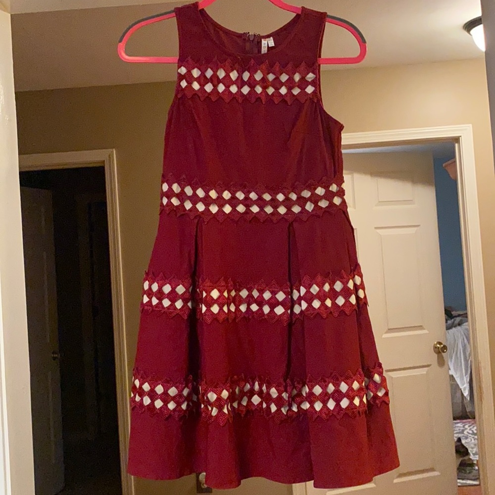 Maroon babydoll dress with pretty detailing. Size M